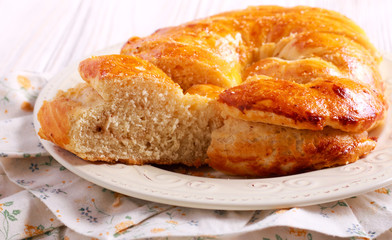 Homemade bread roll, sliced on plate