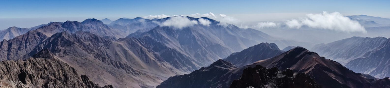 Panorama of Toubkal and other highest mountain peaks of High Atlas mountains in Toubkal national park, Morocco, North Africa