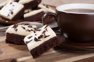 Chocolate fudge brownies and a cup of coffee