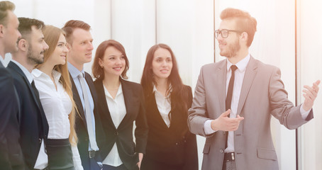 businessman conducts training with business team