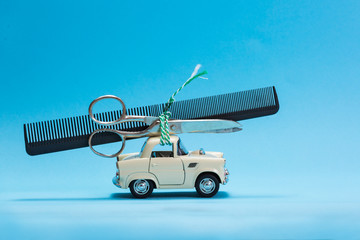 Car toy carrying comb and scissor