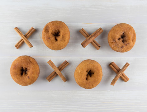 Grid of Cinnamon Xs and Donut Os