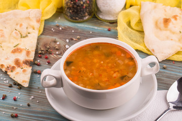Soup rassolnik with greens and pepper
