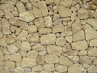 ocre stone rock wall