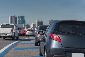 Naklejka premium traffic jam with row of cars on toll way