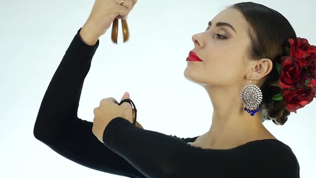 Close-up flamenco dancer on a light background. slow motion