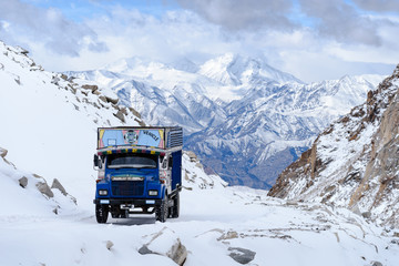 Truck on high snow mountain in Lehladakh India,transportation