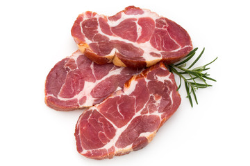 Fresh pig crude meat with rosemary.