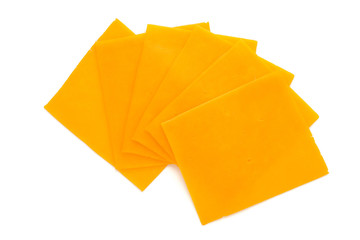 Cheddar cheese slice isolated on the white background.