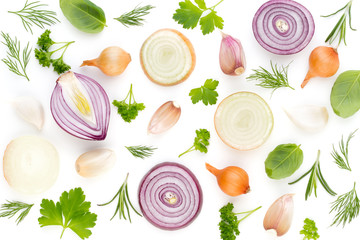 Onion and spices isolated on white background, top view. Wallpaper abstract composition of...