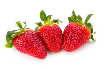 Fresh strawberries close up on white background.