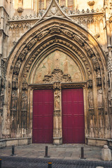 Fototapeta na wymiar Gothic gate entrance of medieval Saint-Sauveur cathedral in Aix-en-Provence, France