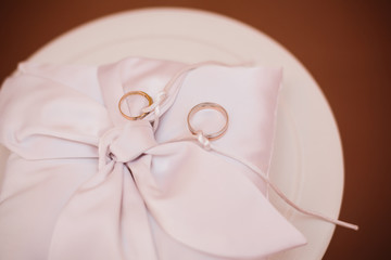 wedding rings on the pillow. ceremony