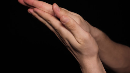 Hand cream on a black background.