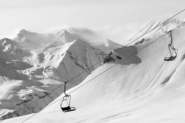 Plexiglas foto achterwand Chair lift at ski resort © BSANI