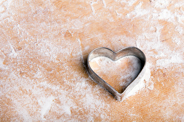 Preparing Christmas cookies. Cookies ingredients, copy space. Heart shape