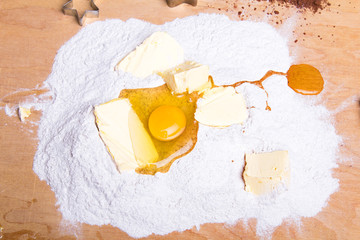 Making dough. Cookies ingredients: flour, eggs and butter.