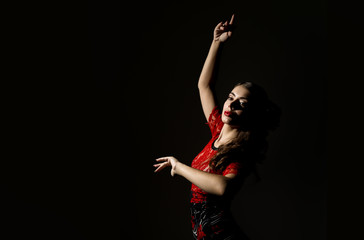flamenco dancer on a dark background. free space for your text
