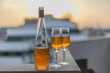 bottle and two glasses