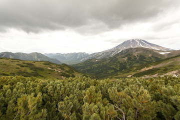 Fototapeta premium View of the volcano Vilyuchinsky in overcast weather, Kamchatka Peninsula, Russia
