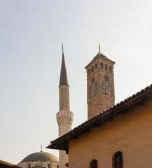 Fototapeta na wymiar View of minaret and clock tower, Sarajevo