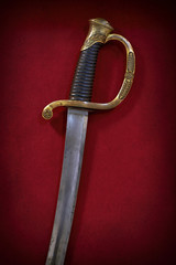 Obraz premium The saber of an infantry officer in the arsenal of the Russian army in the 19th century with a bronze handle.