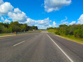 Road and landscape in Texas, USA.
A bright color scenery view on a sunny day in early autumn.