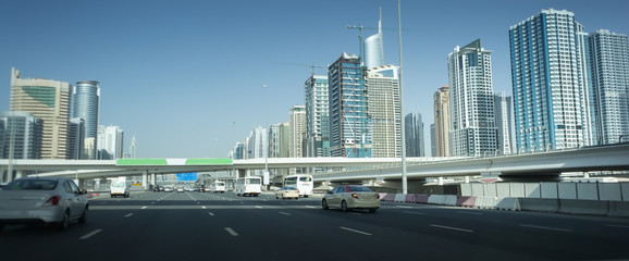 empty asphalt road and modern buildings
