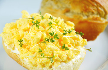 Easy healthy breakfast children menu with scrambled eggs,cream cheese and Garden cress