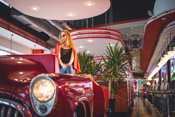 Retro Style Image. Smoking Lady In The Bar