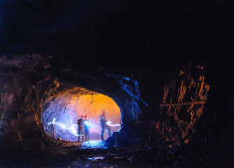 Diggers in a big cave