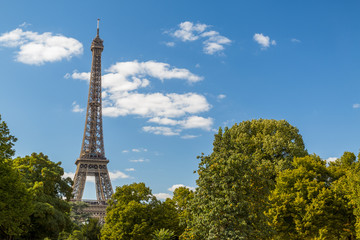 Eiffel Tower in summer on blue sky