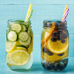 Fototapeta na wymiar Detox fruit infused water. Refreshing summer homemade cocktail