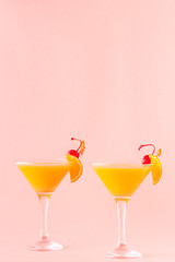 Yellow cocktail on a bright background.