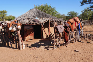 Himba village with traditional huts near Etosha National Park in Namibia, Africa