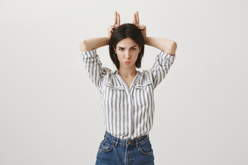 Do not play with my feelings. Studio shot of angry cute european female girlfriend in fashionable...