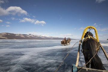 sledge ride on ice covered lake Khovsgol, Mongolia