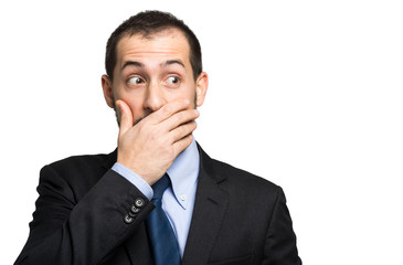 Young businessman in an embarrassing situation