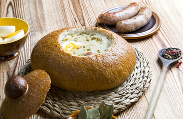 White borscht on a wooden background