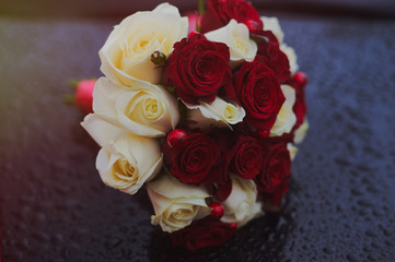 Wedding bouquet of the bride in the rain