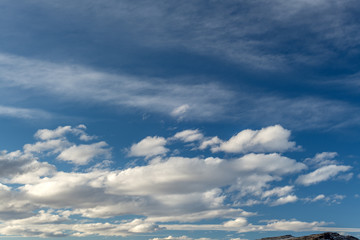 Obraz premium Unique cloud pattern forming over the landscape of our world