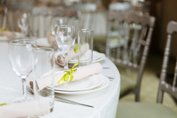 Elegant table set up for a wedding banquet or party event. Wedding table setting. 