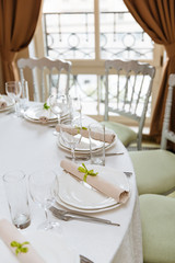 Elegant table set up for a wedding banquet or party event. Wedding table setting. 