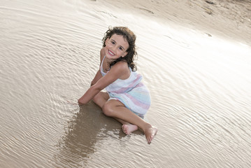 little girl vacationing on the beach