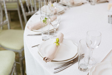 Elegant table set up for a wedding banquet or party event. Wedding table setting. 