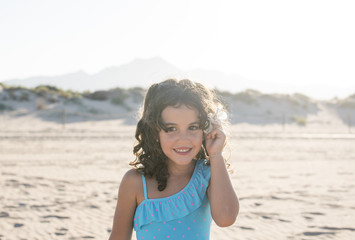 little girl vacationing on the beach