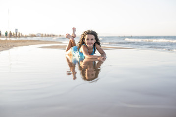 little girl vacationing on the beach