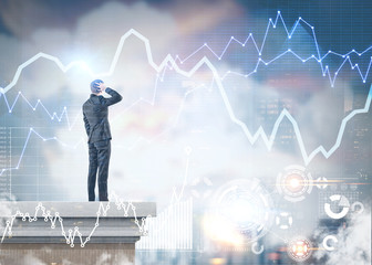 Confused businessman on roof, HUD graphs