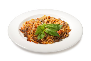 pasta with meat, carrots and basil isolated on white background