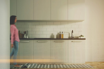 White kitchen interior, white counters toned